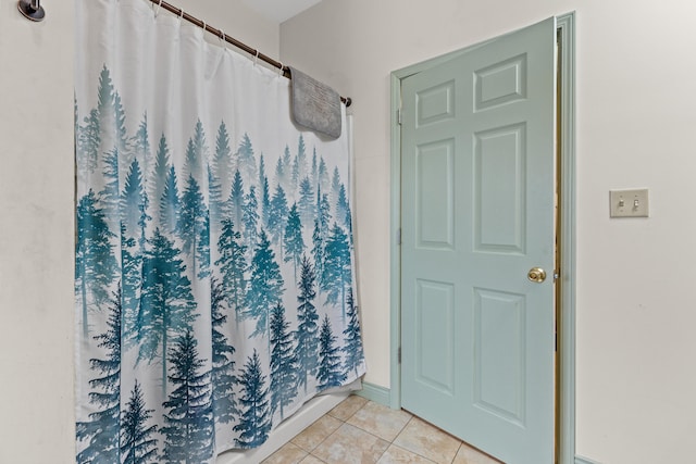 bathroom featuring tile patterned flooring