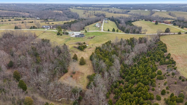 birds eye view of property featuring a rural view