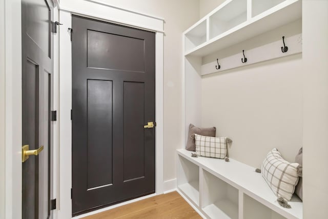 mudroom with light hardwood / wood-style flooring