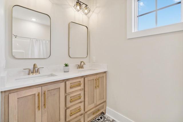 bathroom with vanity and a shower with curtain