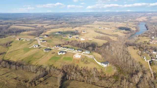 bird's eye view with a rural view and a water view