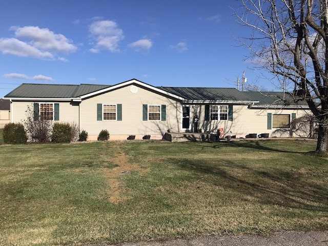 view of front of home featuring a front yard