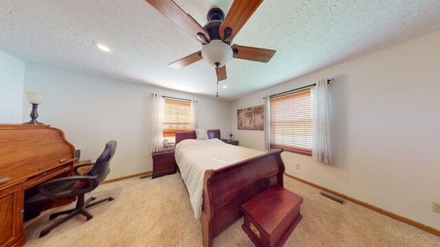 unfurnished room featuring carpet flooring and a textured ceiling