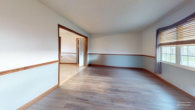 carpeted living room with a wood stove, lofted ceiling, ceiling fan, and a textured ceiling