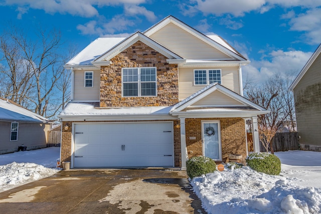 view of front of property with a garage