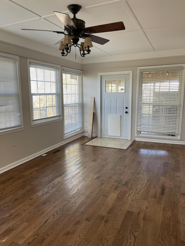 entryway featuring hardwood / wood-style flooring, ceiling fan, and a healthy amount of sunlight