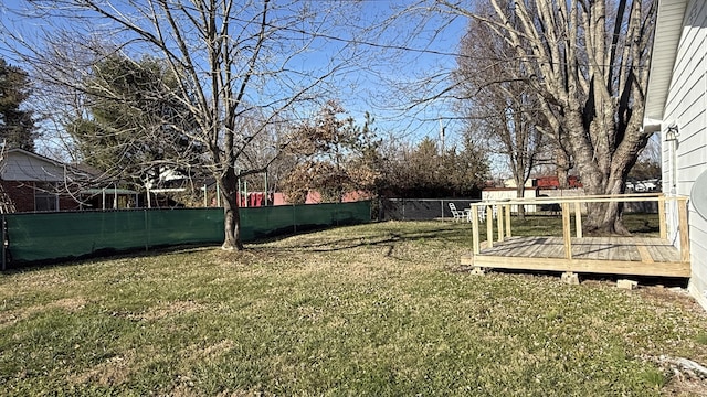 view of yard featuring a wooden deck