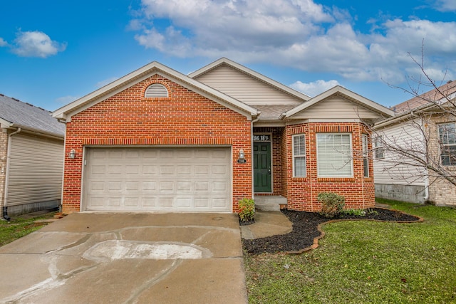 view of front of property with a garage and a front lawn