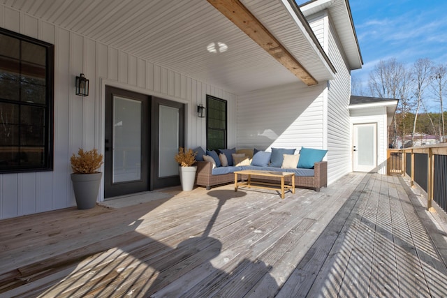 deck with outdoor lounge area