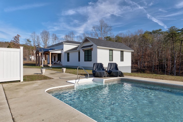 back of property featuring a patio area