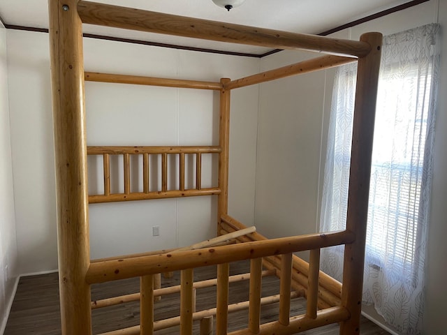 stairs with hardwood / wood-style floors