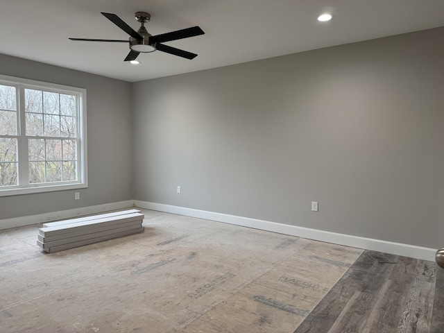 unfurnished room featuring ceiling fan