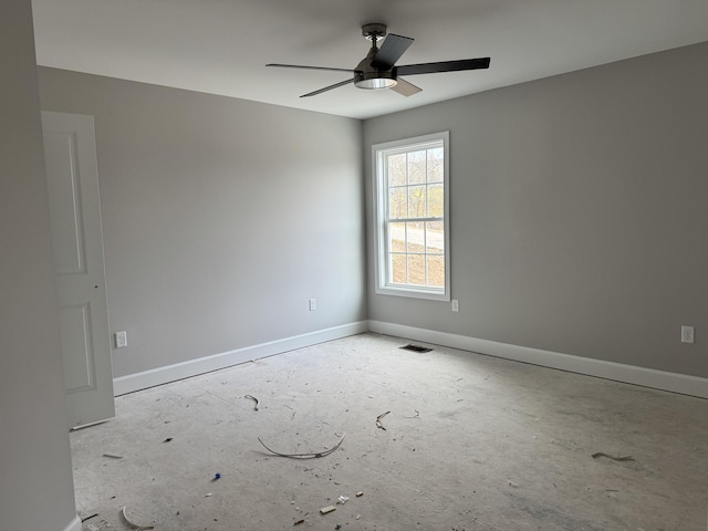 spare room with ceiling fan