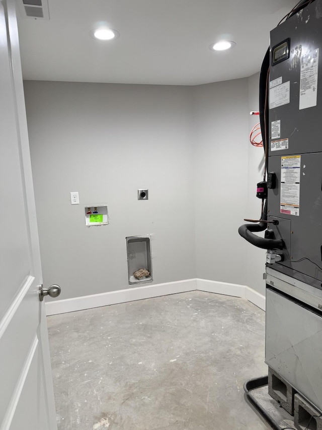 laundry area featuring hookup for an electric dryer and heating unit