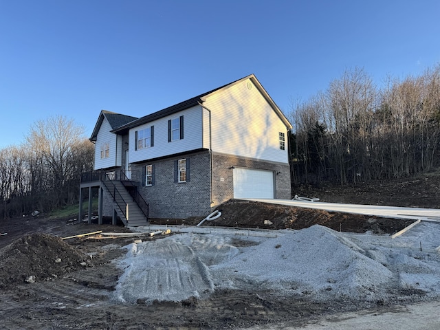 view of property exterior featuring a garage