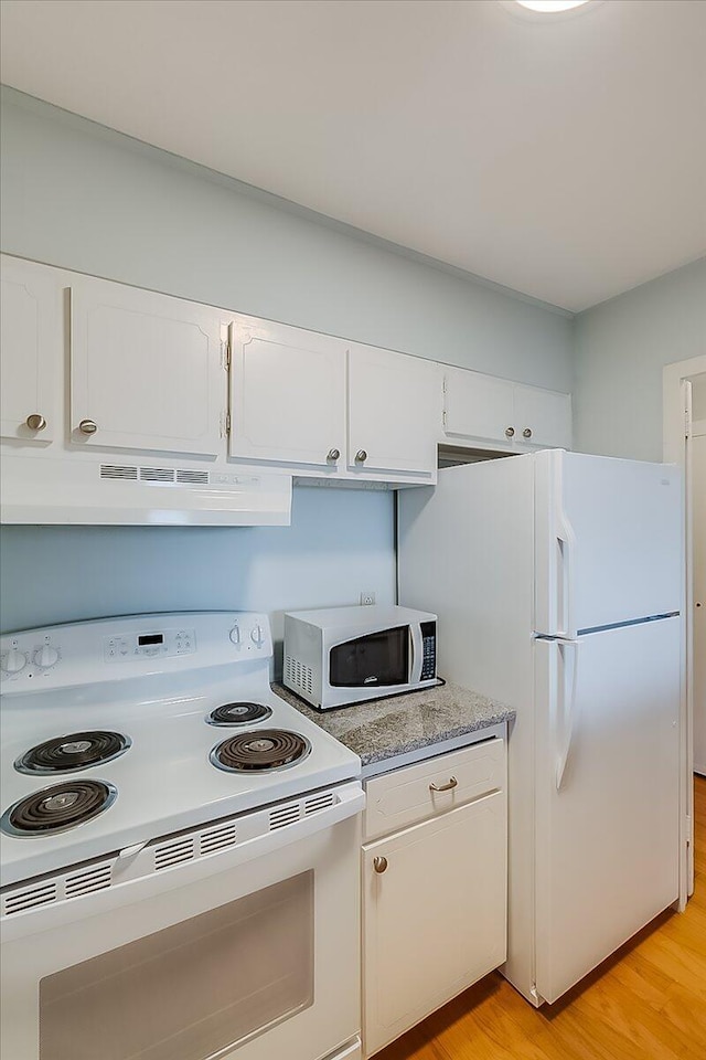 kitchen featuring white cabinetry, white appliances, and light hardwood / wood-style flooring