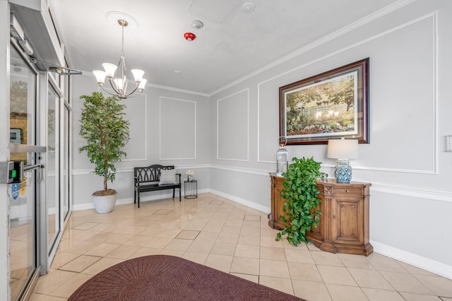 interior space with an inviting chandelier and crown molding