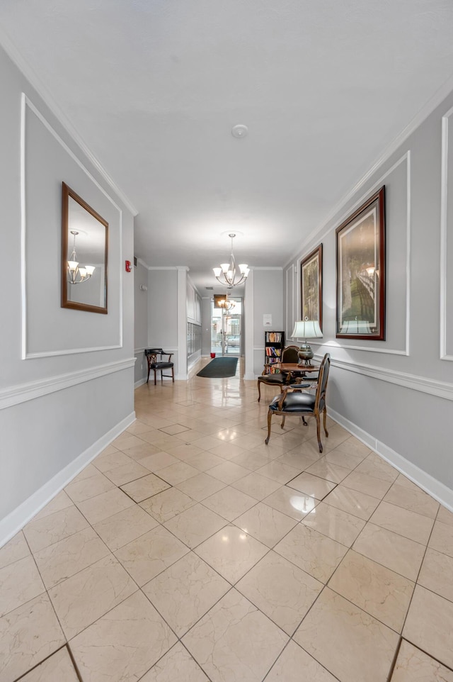 dining space with a notable chandelier and ornamental molding