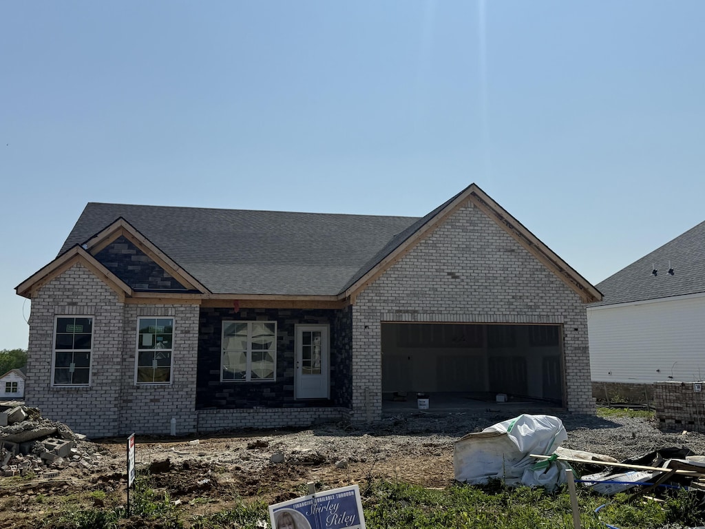 232 Skaggs Blvd, Nicholasville, KY 40356 - view of front facade with a garage and brick siding