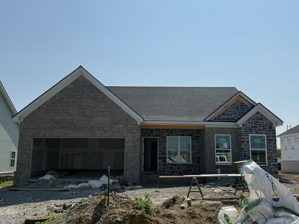 244 Skaggs Blvd, Nicholasville, KY 40356 - view of front of home with a garage and brick siding