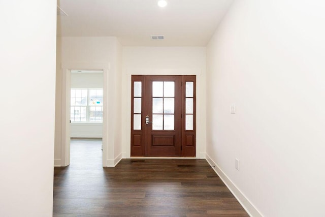 entryway with baseboards, visible vents, recessed lighting, and dark wood finished floors