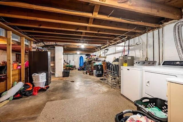 basement featuring washing machine and dryer