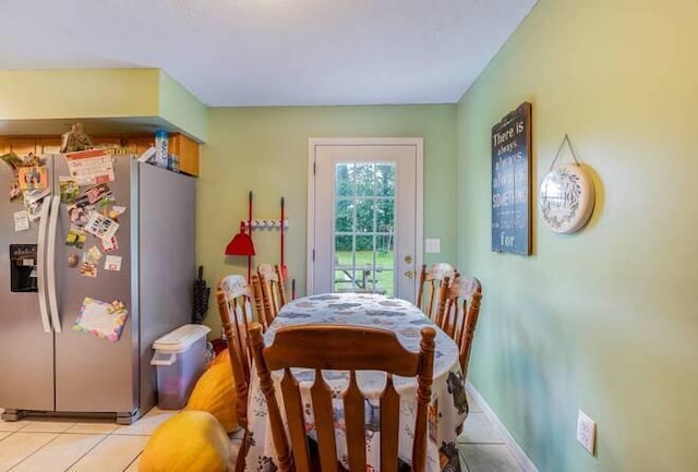 dining room with light tile patterned floors