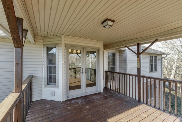 wooden terrace featuring french doors