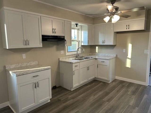 kitchen with ceiling fan, white cabinetry, sink, and dark wood-type flooring