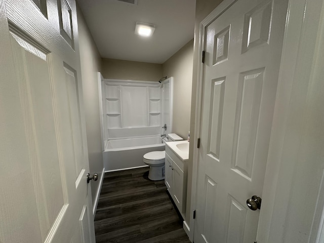 full bathroom with wood-type flooring, vanity, bathing tub / shower combination, and toilet