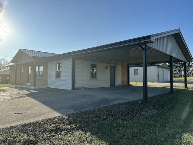 view of front of property with a carport