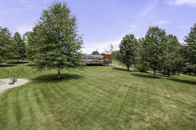 view of yard with a wooden deck