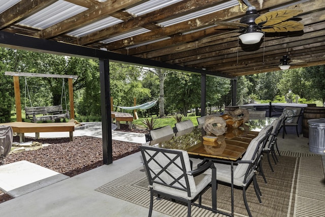 view of patio featuring ceiling fan