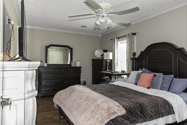 bedroom featuring ceiling fan, dark hardwood / wood-style flooring, ornamental molding, and a textured ceiling