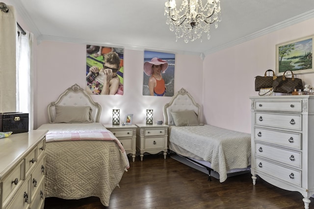 bedroom featuring dark hardwood / wood-style flooring, crown molding, and an inviting chandelier