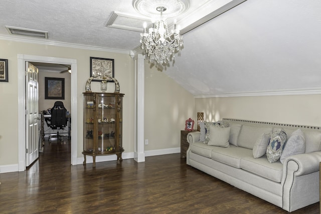 living room featuring an inviting chandelier, vaulted ceiling, ornamental molding, a textured ceiling, and dark hardwood / wood-style flooring