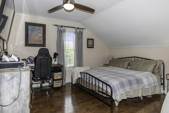 bedroom featuring dark hardwood / wood-style flooring, vaulted ceiling, and ceiling fan