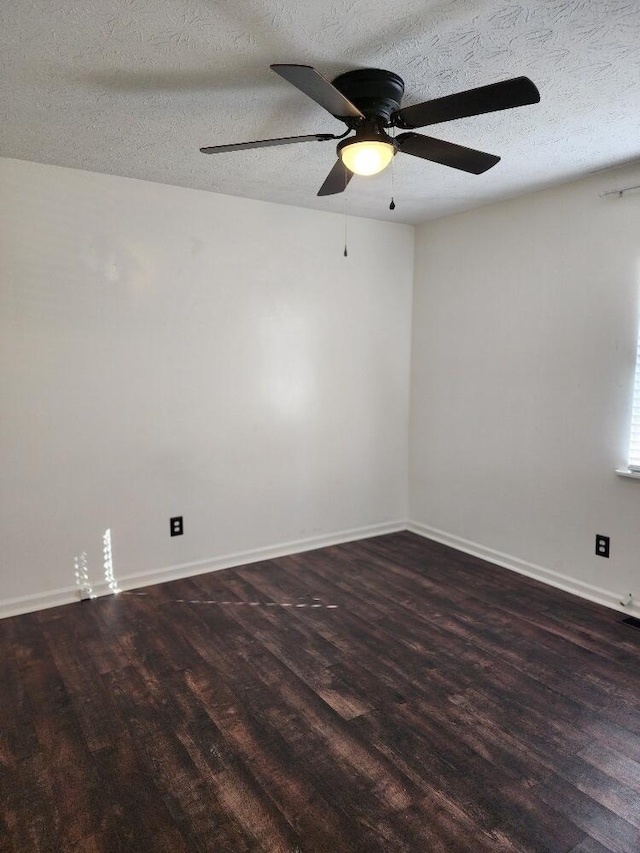 empty room featuring ceiling fan and a textured ceiling