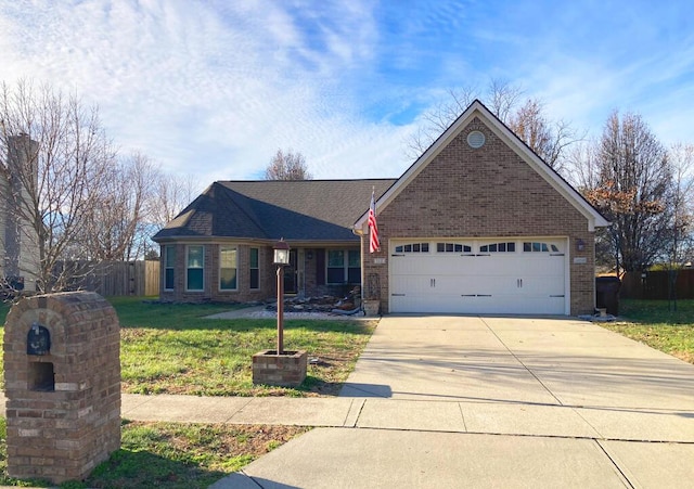 ranch-style home with a front yard and a garage