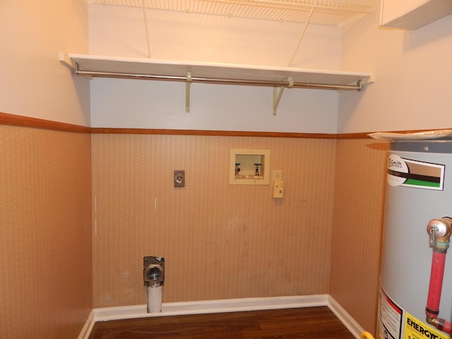 washroom with gas water heater, laundry area, dark wood-type flooring, washer hookup, and electric dryer hookup