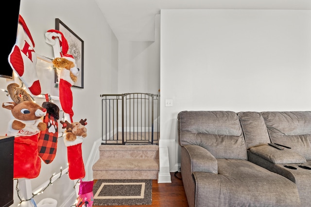 bedroom with wood finished floors and baseboards