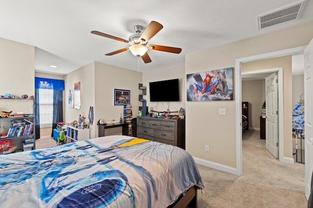 carpeted bedroom featuring visible vents, ceiling fan, and baseboards