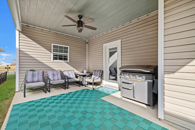 view of patio / terrace featuring ceiling fan, fence, and area for grilling