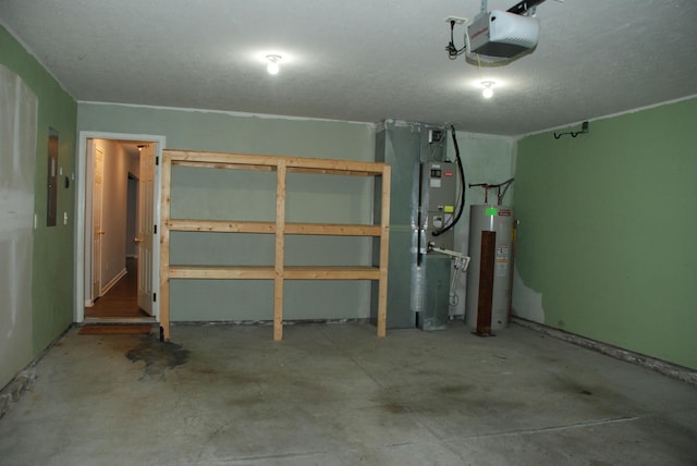 garage with a garage door opener and water heater