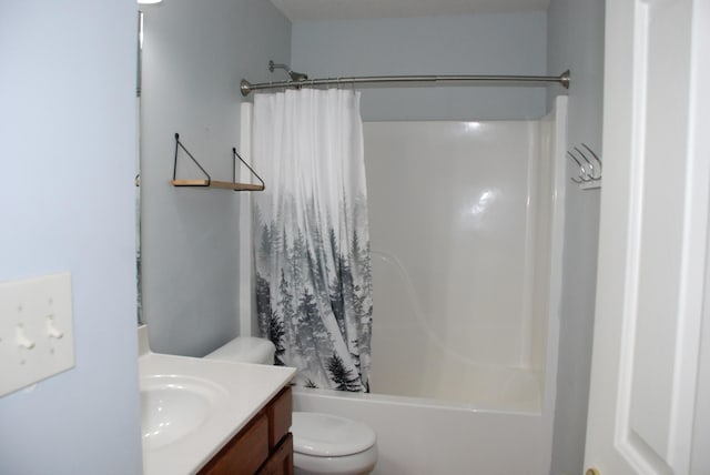 full bathroom featuring shower / tub combo, vanity, and toilet