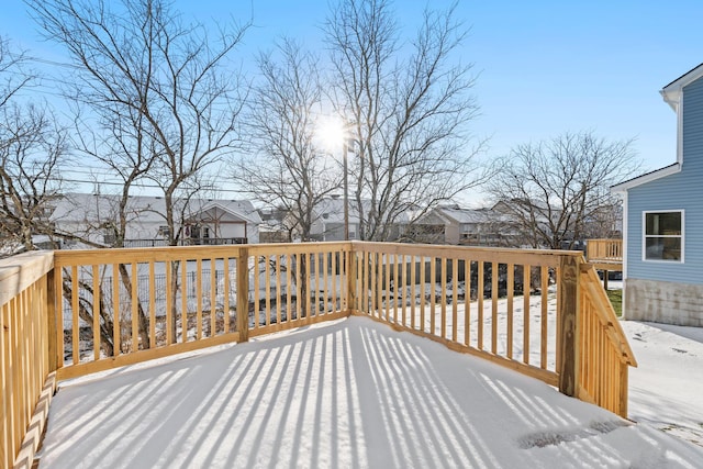 view of snow covered deck