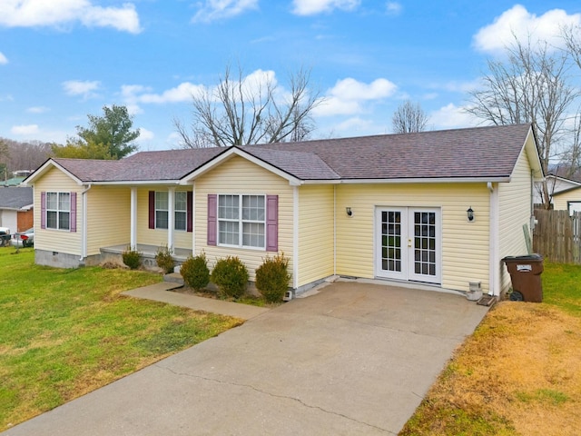 ranch-style home with a front lawn