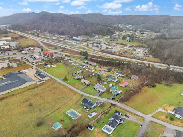 drone / aerial view featuring a mountain view