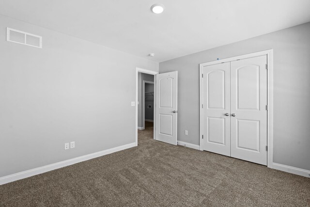 full bathroom featuring baseboards, visible vents, toilet, wood finished floors, and vanity