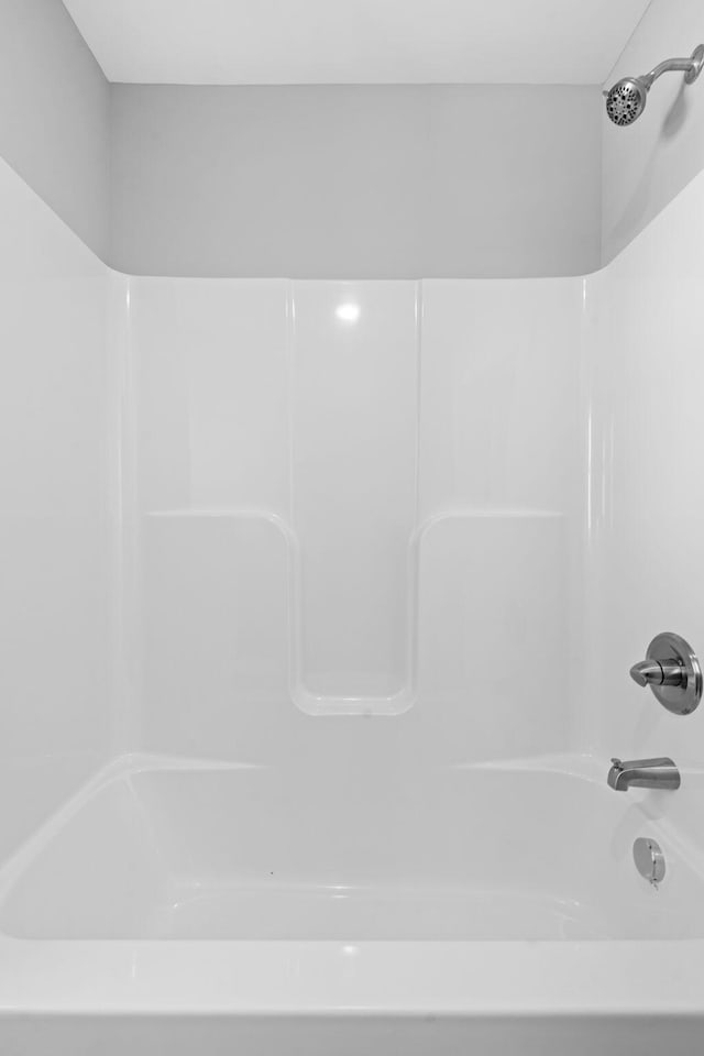 full bathroom with bathtub / shower combination
